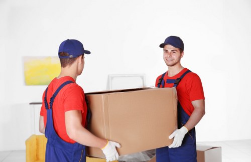 Professional furniture removals team loading items in Richmonduponthames