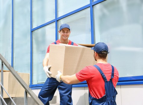 Man and van loading furniture for a local move in Richmond upon Thames