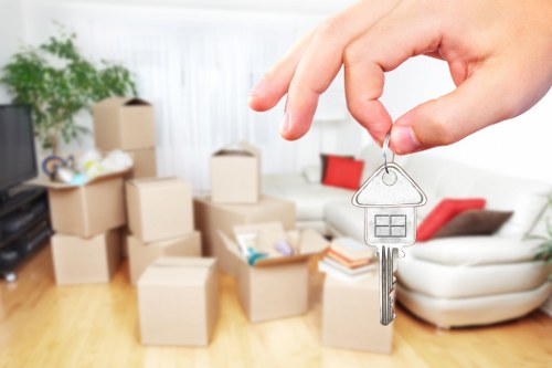 Removal van and moving team in a Richmond upon Thames residential street