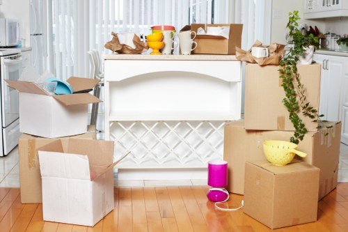 Professional office movers handling desks and equipment in a Richmond upon Thames office