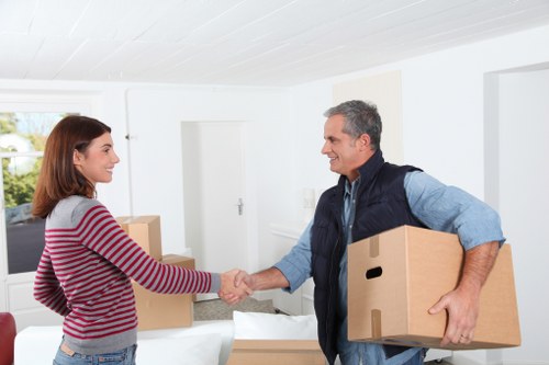 Richmond upon Thames man and van service loading furniture carefully