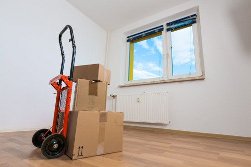 Commercial movers relocating office equipment in the borough