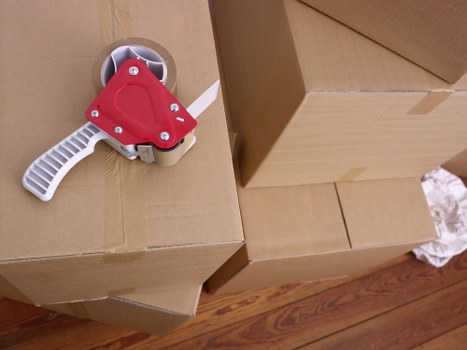 Local removal team packing household items for a Richmond upon Thames move